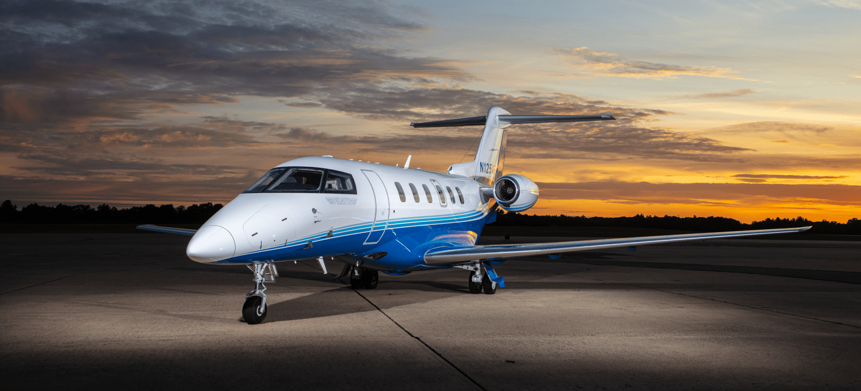 PC-24 on runway at sunset